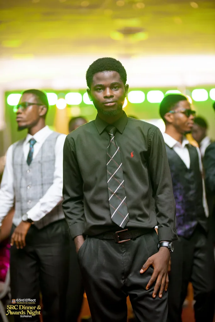 Attendee listening during the awards program