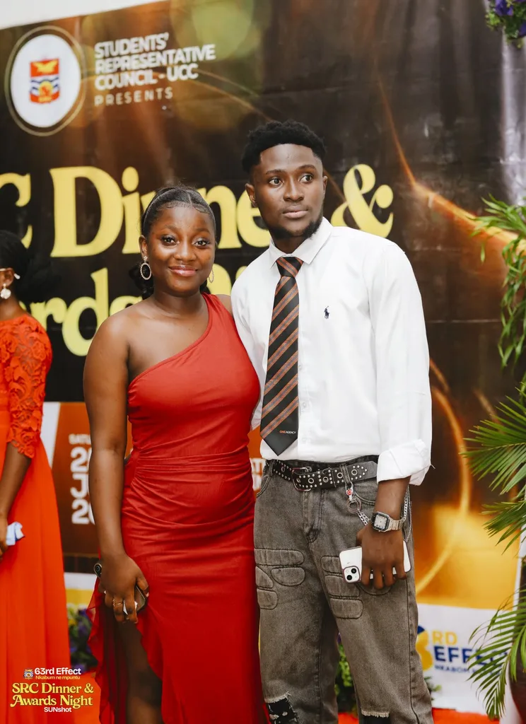 Attendees in front of the awards-night branding